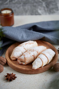 Christmas atmospheric crescent bagels with cinnamon sticks, star anise and walnuts.