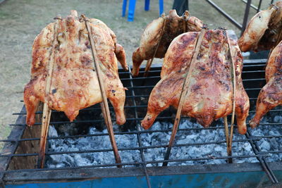 Close-up of meat on barbecue grill