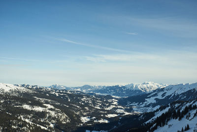 Scenic view of snowcapped mountains against sky