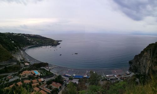 High angle view of town by sea