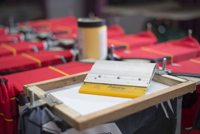 Close-up of empty seats on table