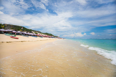 Scenic view of beach against sky