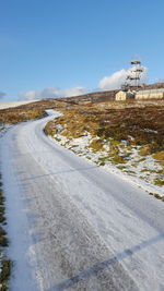 Road against sky during winter