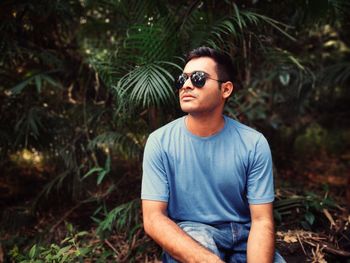 Portrait of young man wearing sunglasses