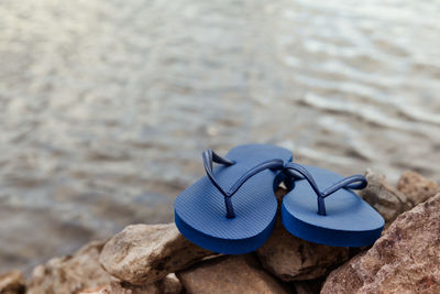 High angle view of shoes on rocks