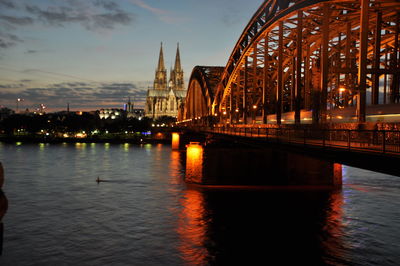 View of bridge over river in city