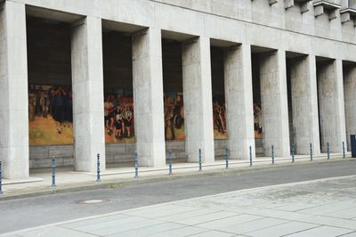 Exterior of building with bridge in background