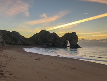 Scenic view of sea against sky during sunset