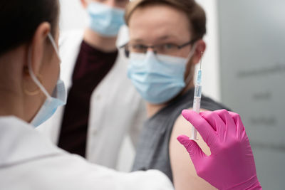 Dentist examining patient