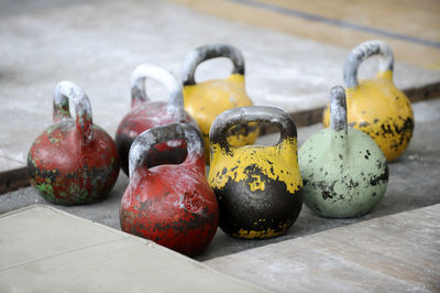 Close-up of kettlebells on table