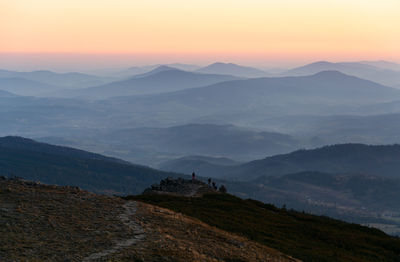 Scenic view of mountains against sky during sunset