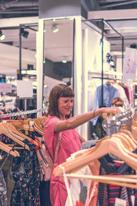 Portrait of woman standing in store