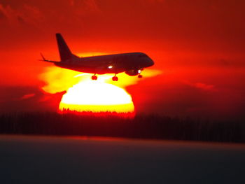 View of illuminated city at sunset