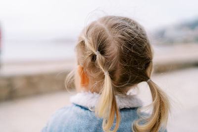 Rear view of woman with long hair