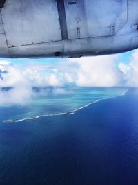 Scenic view of sea against cloudy sky