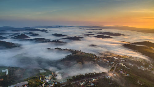 High angle view of landscape against sky during sunset