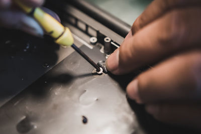 Close-up of person working