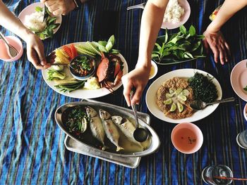 High angle view of people eating food