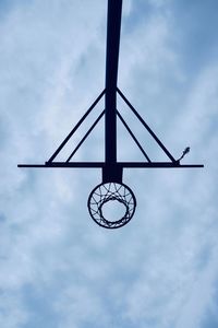 Basketball hoop silhouette on the street in bilbao city spain