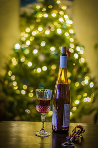 Close-up of wine bottles on table