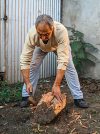 Rear view of man working