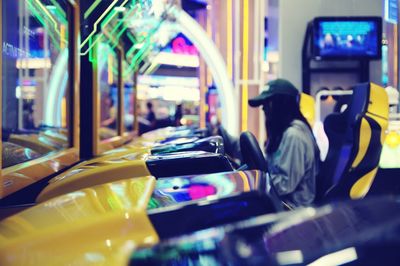 Side view of woman playing game