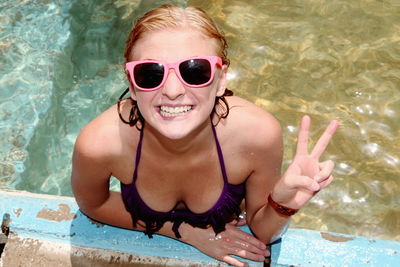 Portrait of young woman in water