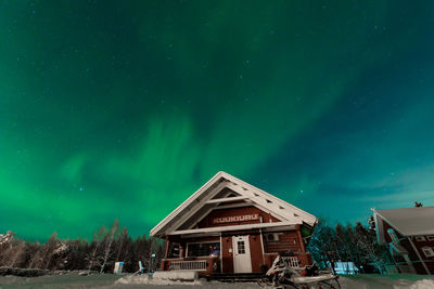 Low angle view of building against sky at night