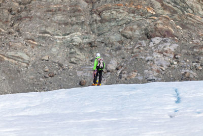 Person standing on rock