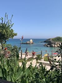 Scenic view of sea against blue sky