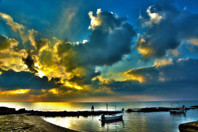 Scenic view of sea against sky during sunset