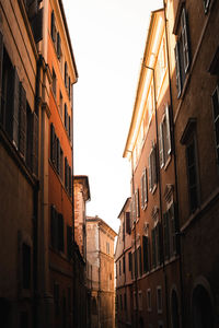 Low angle view of buildings against clear sky