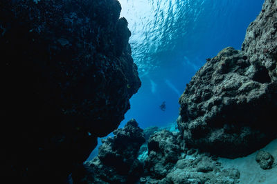 View of rock formation in sea