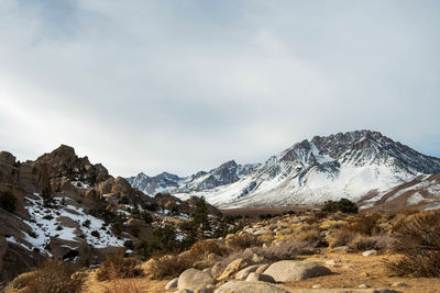 Scenic view of snowcapped mountains against sky