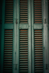 Full frame shot of closed shutter of building