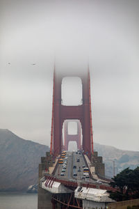 Bridge over river against sky