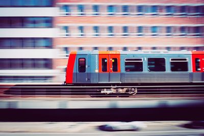 Blurred motion of train in city