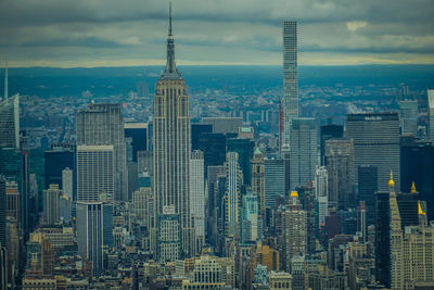 Modern buildings in city against sky