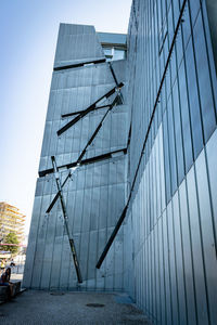 Low angle view of modern building against clear sky