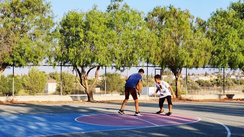 Playing basketball with friends