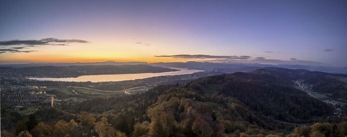 Scenic view of landscape against sky during sunset