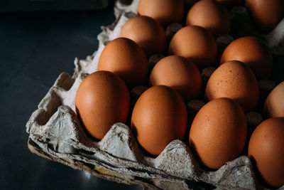 High angle view of eggs in container