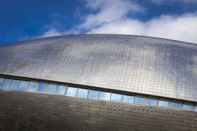 Low angle view of modern building against sky