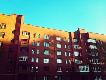 Residential buildings against clear sky