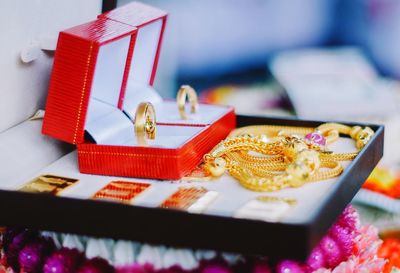 Close-up of jewelries on table