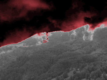 High angle view of red balloons flying in sky