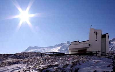 Building against sky during winter