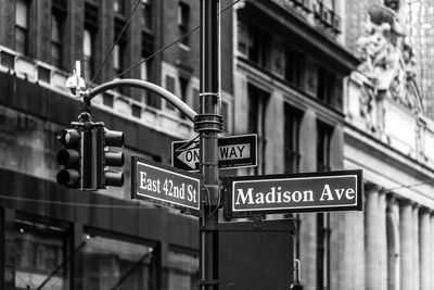 Signboard and road signal in city