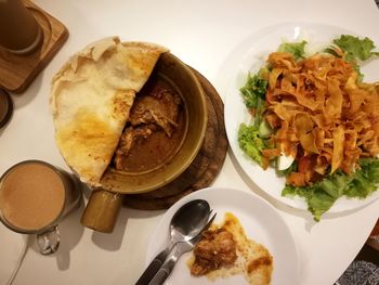 High angle view of breakfast served on table