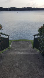 Tranquil scene of landscape with lake in background